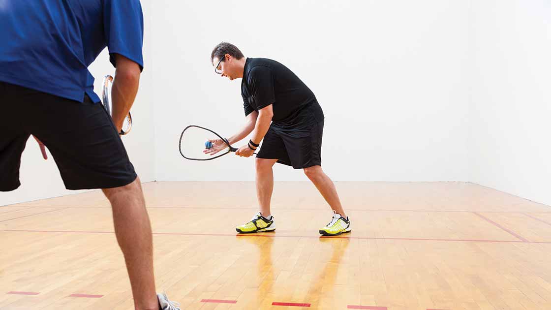Image of two men playing racquetball